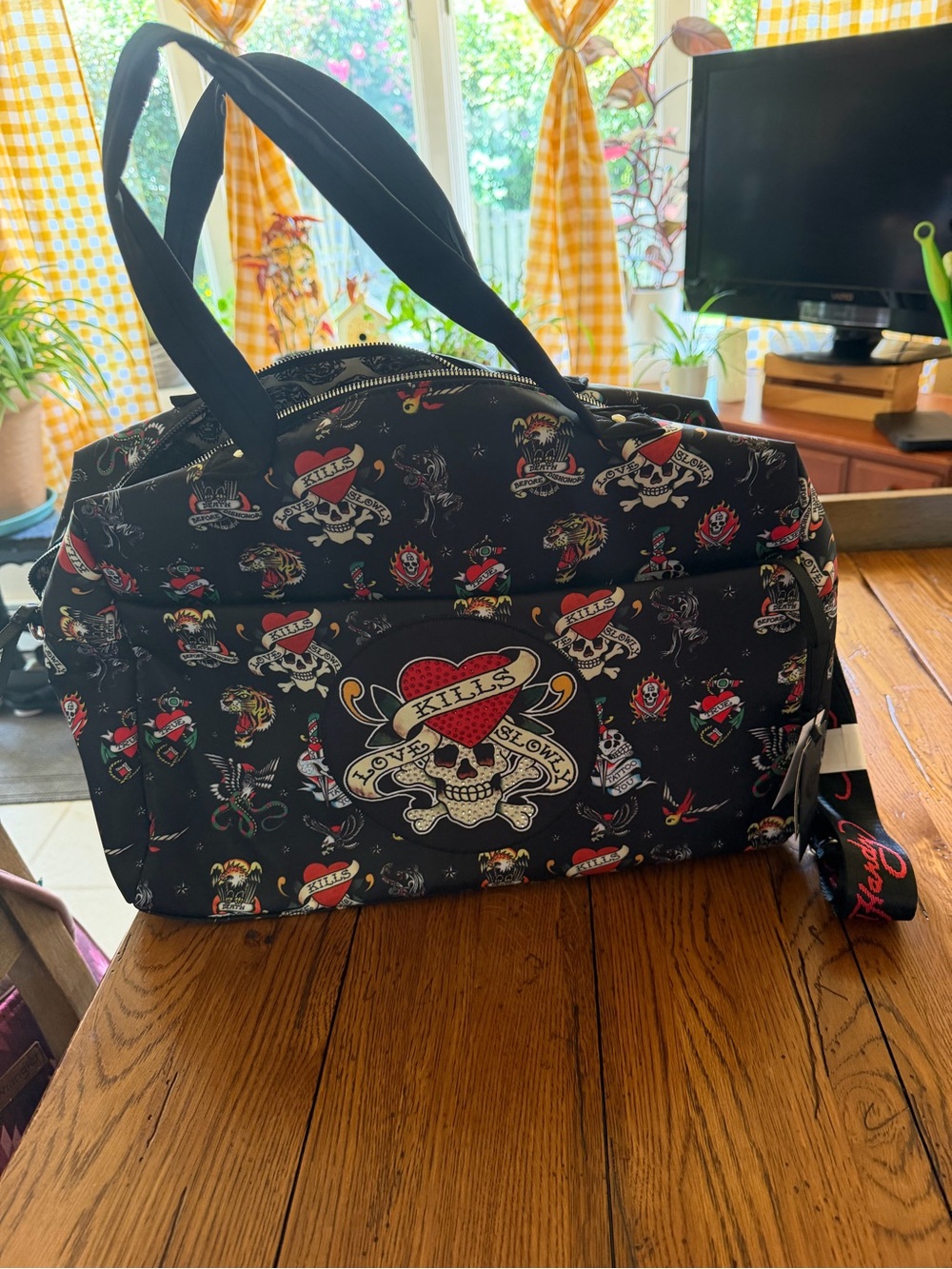 Ed Hardy Black Tattoo-Print Weekender Bag with Red & Green Accents